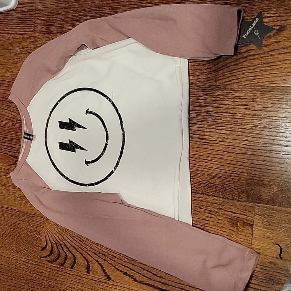 New girls size 11/12 smiley t shirt